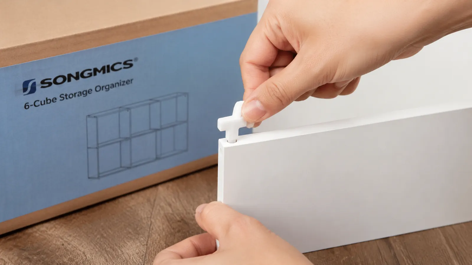 Hand pressing a SONGMICS plastic connector clip into a shelf panel corner, showing proper full-seat position